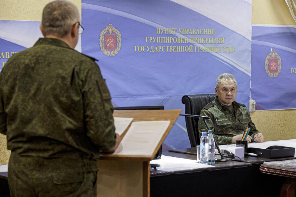 In this photo released on Monday, June 26, 2023 by Russian Defense Ministry Press Service, Russian Defense Minister Sergei Shoigu, right, listens to an officer as he inspects a command post of one of the formations of the Zapad (West) group of Russian troops at an undisclosed location of Ukraine. Shoigu made his first public appearance Monday since a mercenary uprising demanded his ouster, inspecting troops in Ukraine. (Russian Defense Ministry Press Service via AP)