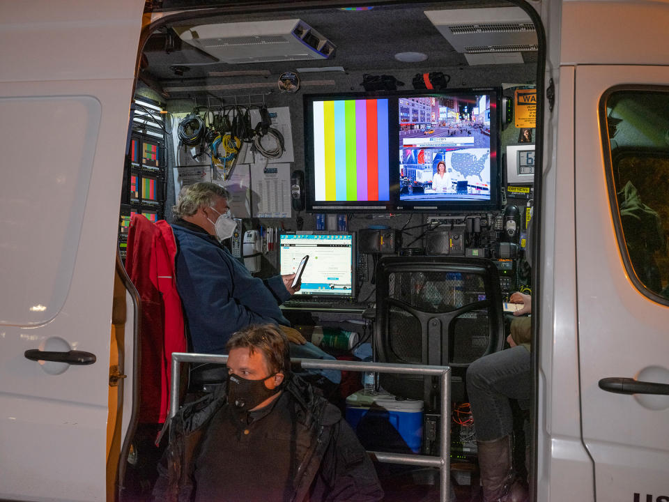 Political news coverage is displayed in a van in Washington, D.C., on Nov. 3, 2020.<span class="copyright">Elizabeth Bick for TIME</span>