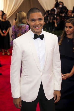 Television personality Trevor Noah arrives at the Metropolitan Museum of Art Costume Institute Gala 2015 celebrating the opening of "China: Through the Looking Glass," in Manhattan, New York May 4, 2015. Picture taken May 4, 2015. REUTERS/Lucas Jackson