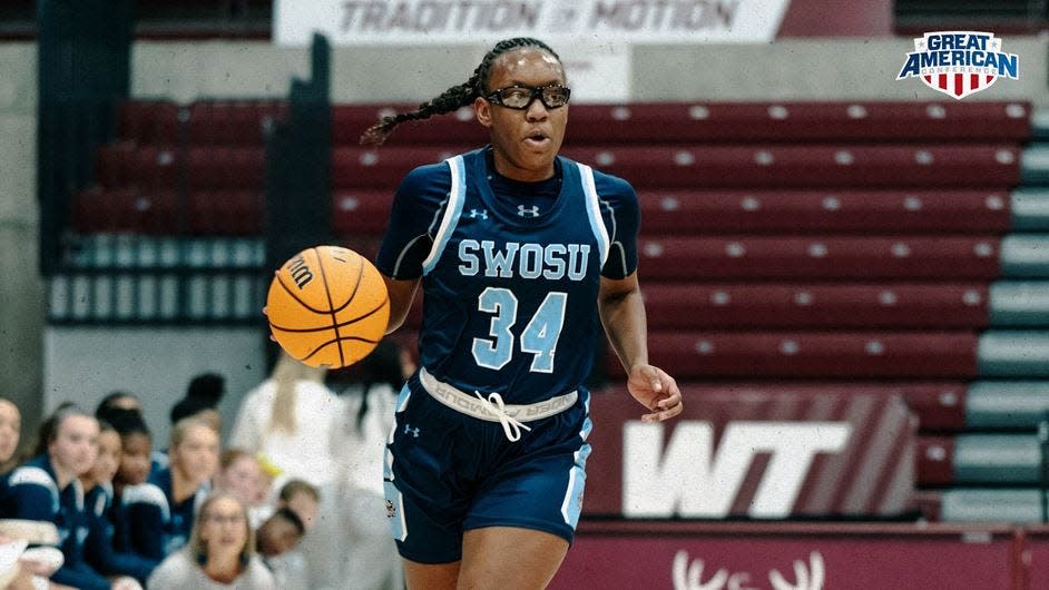 Southwestern Oklahoma State's Makrya Tramble dribbles the ball during a recent game. Tramble played at Shawnee High School.