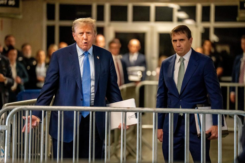 Former President Donald Trump arrives at Manhattan criminal court and delivers remarks to the media alongside his attorney Todd Blanche (AP)