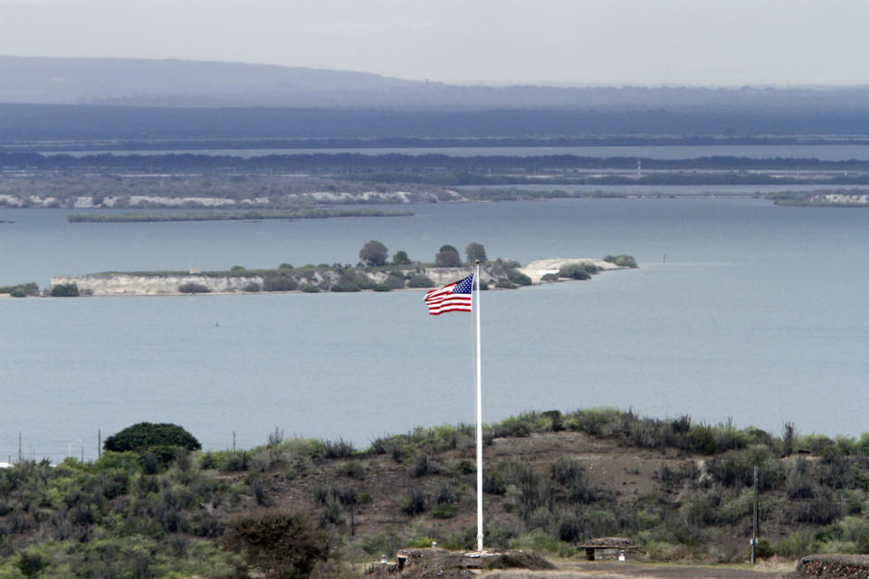 GUANTANAMO BAY, CUBA - MAY 5:  An American flag flies at Hospital Cay on May 5, 2012 in Guantanamo Bay, Cuba. Khalid Sheik Mohammed and four alleged accomplices will be arraigned on charges including 2976 counts of murder during the September 11th terrorist attacks. (Photo by Walter Michot-Pool/The Miami Herald via Getty Images)