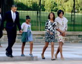 Frist lady Michelle Obama, Malia Obama, Sasha Obama, and U.S. President Barack Obama walk across LaFayette Park to St. John's Episcopal Church on September 19, 2010 in Washington, DC. The President has no public events scheduled for today. (Photo by Dennis Brack-Pool/Getty Images)