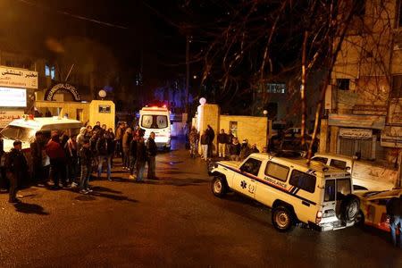 Ambulances are seen in front of the Italian hospital where some of the injured were evacuated to after an attack, in the city of Karak, Jordan, December 18, 2016.REUTERS/Muhammad Hamed