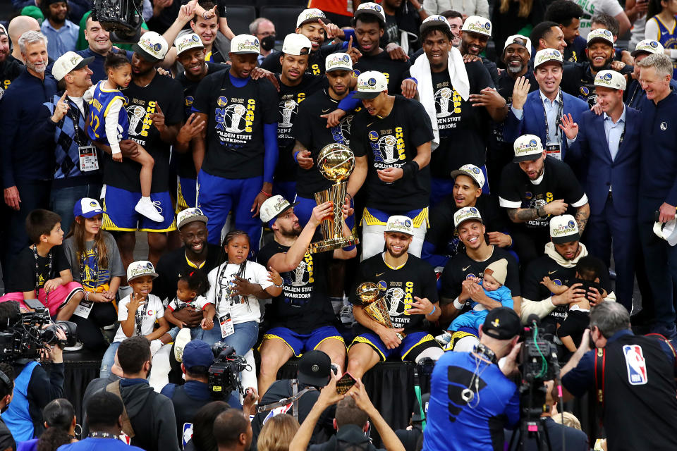 BOSTON, MASSACHUSETTS - JUNE 16: The Golden State Warriors pose for a photo after defeating the Boston Celtics 103-90 in Game Six to win the 2022 NBA Finals at TD Garden on June 16, 2022 in Boston, Massachusetts. NOTE TO USER: User expressly acknowledges and agrees that, by downloading and/or using this photograph, User is consenting to the terms and conditions of the Getty Images License Agreement. (Photo by Adam Glanzman/Getty Images)