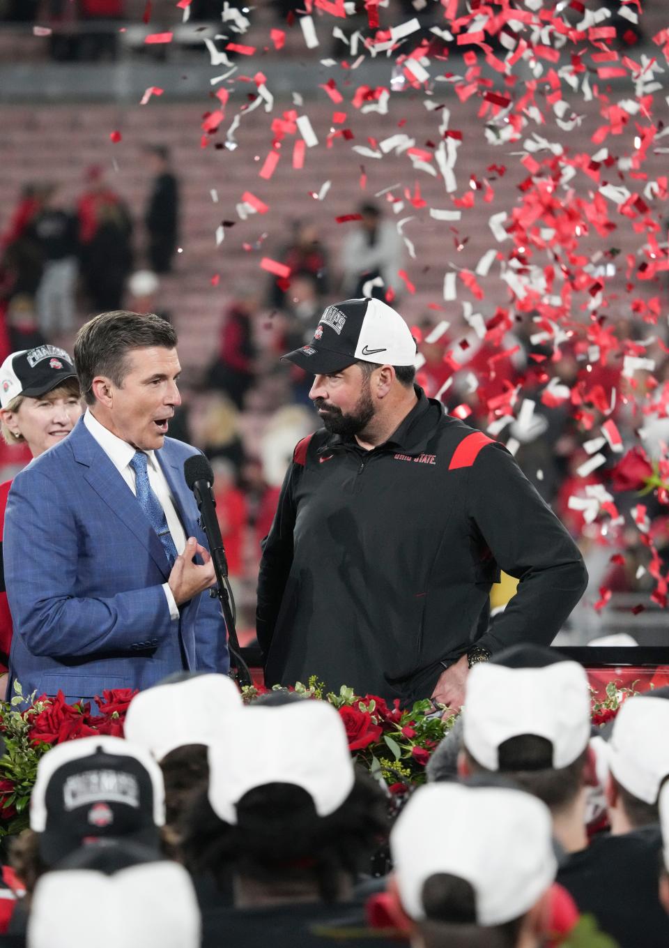 Sat., Jan. 1, 2022; Pasadena, California, USA; Ohio State Buckeyes head coach Ryan Day chats with ESPN’s Rece Davis during the trophy presentation following the Buckeyes’ 48-45 victory against the Utah Utes in the 108th Rose Bowl Game.