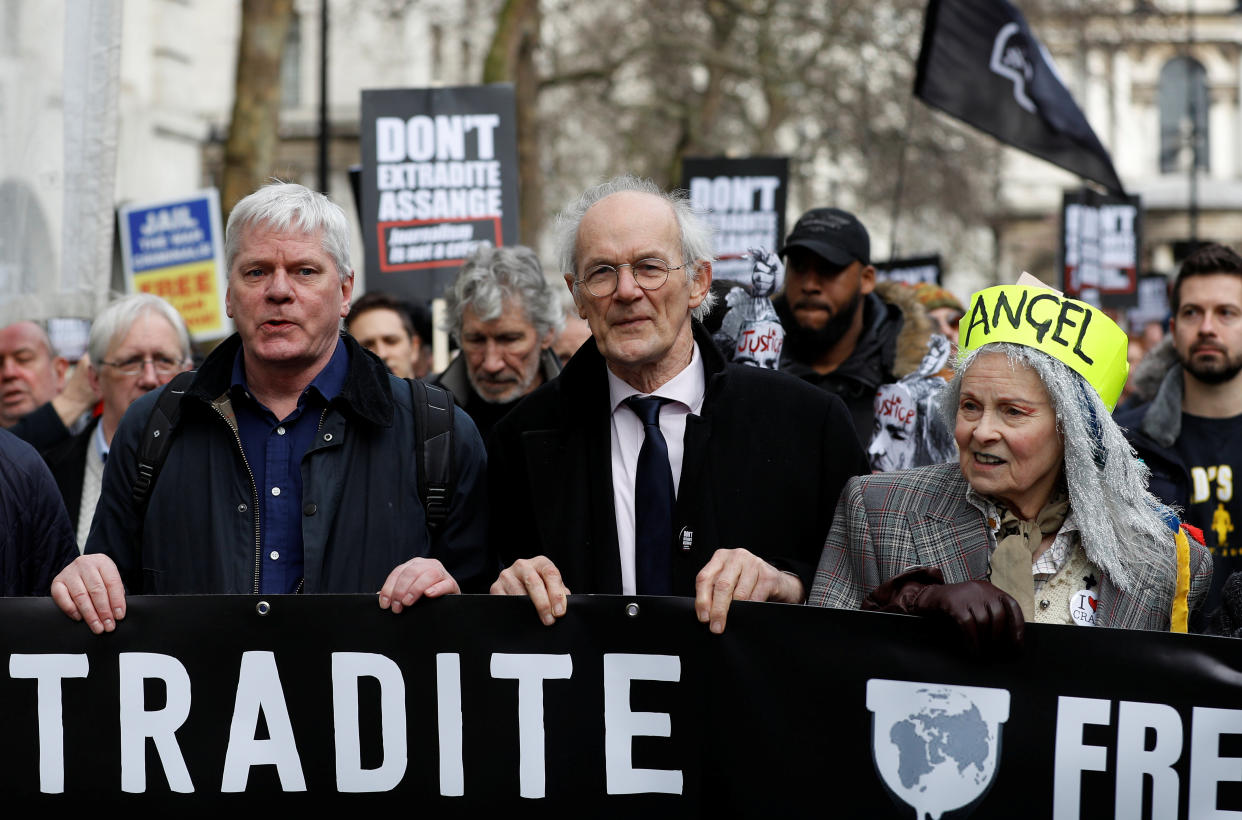 Editor in chief of WikiLeaks Kristinn Hrafnsonn, Assange's Father John Shipton and fashion designer Vivienne Westwood attend a protest against the extradition of Julian Assange outside the Australian High Commission in London, Britain February 22, 2020. REUTERS/Peter Nicholls