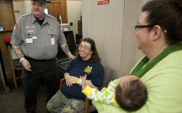 Mike and Linda Ackley (sitting) after the birth of Kimberley (J. Scott Park | Mlive.com)