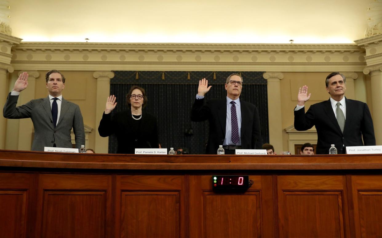 Legal scholars taking the oath - Getty Images North America