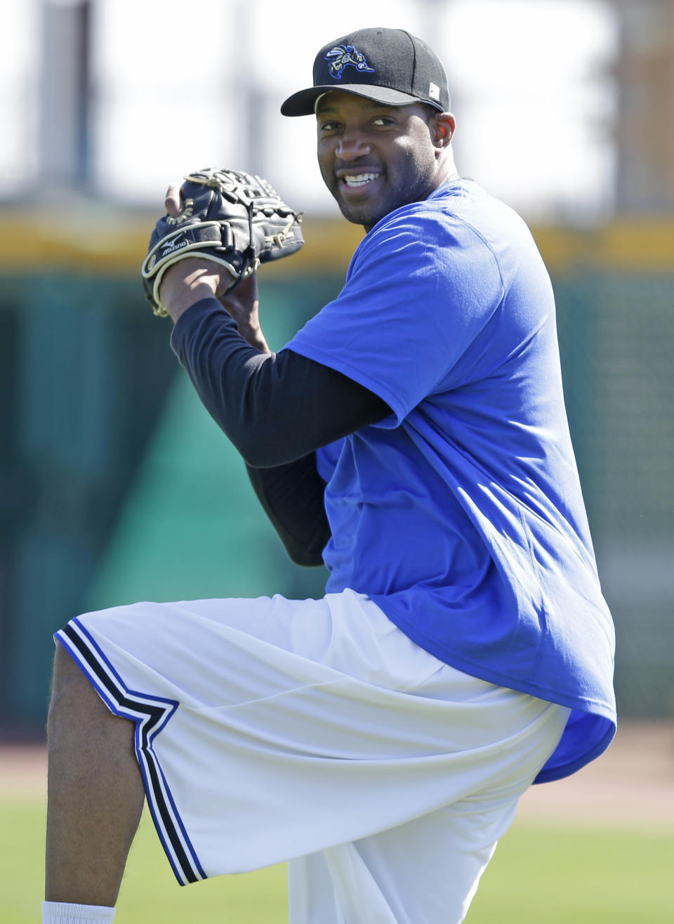 Retired NBA All-Star Tracy McGrady throws a pitch at the Sugar Land Skeeters baseball stadium Wednesday, Feb. 12, 2014, in Sugar Land, Texas. McGrady hopes to try out as a pitcher for the independent Atlantic League Skeeters. (AP Photo/Pat Sullivan)