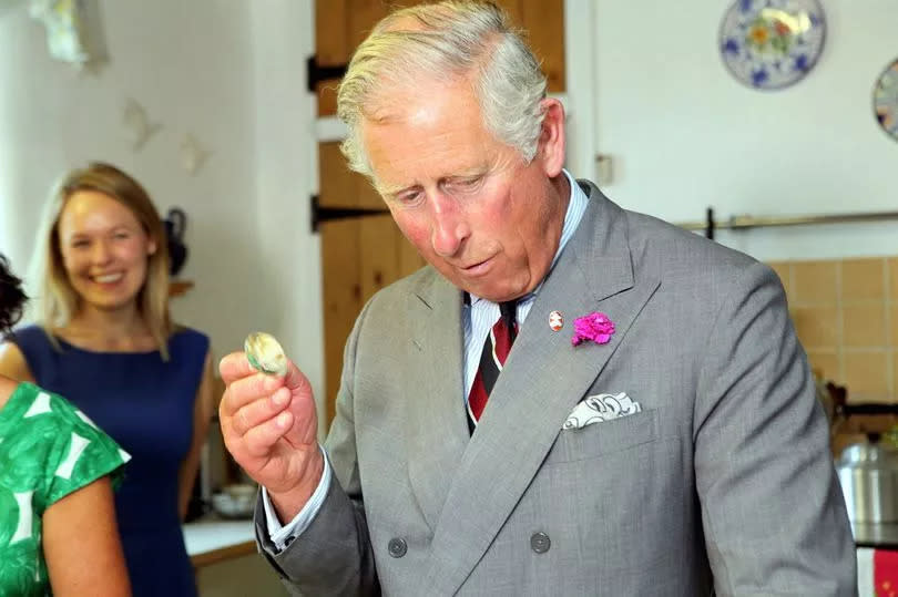 King Charles eating something he's not banned from eating. Hopefully