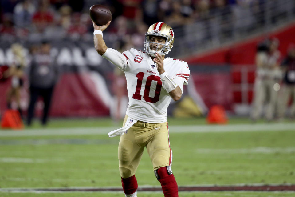 San Francisco 49ers quarterback Jimmy Garoppolo (10) throws against the Arizona Cardinals during the first half of an NFL football game, Thursday, Oct. 31, 2019, in Glendale, Ariz. (AP Photo/Ross D. Franklin)