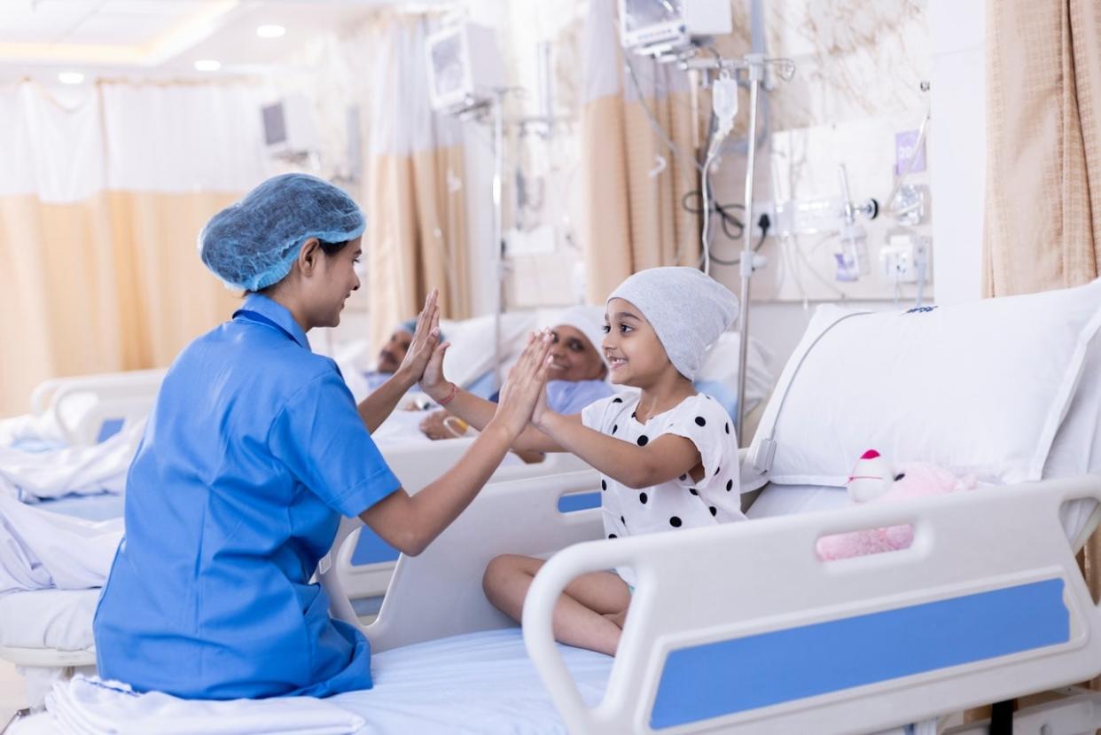 Child patient with nurse