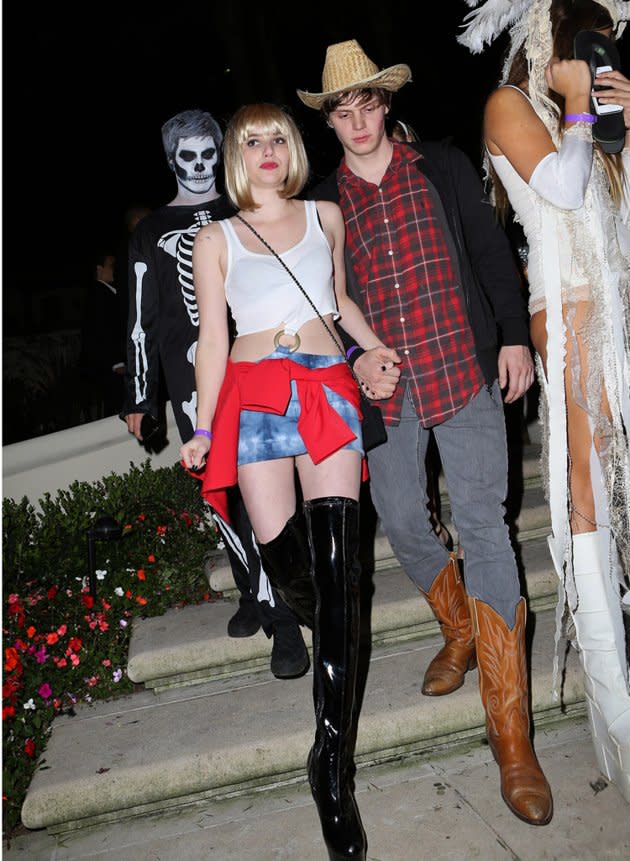 Emma Roberts kept it all in the family at a costume party on Friday when she dressed as the fictional Vivian Ward, the call girl her Aunt Julia played in 1990’s iconic “Pretty Woman.” Her boyfriend Evan Peters ("American Horror Story") went as a cowboy. (10/27/2012)