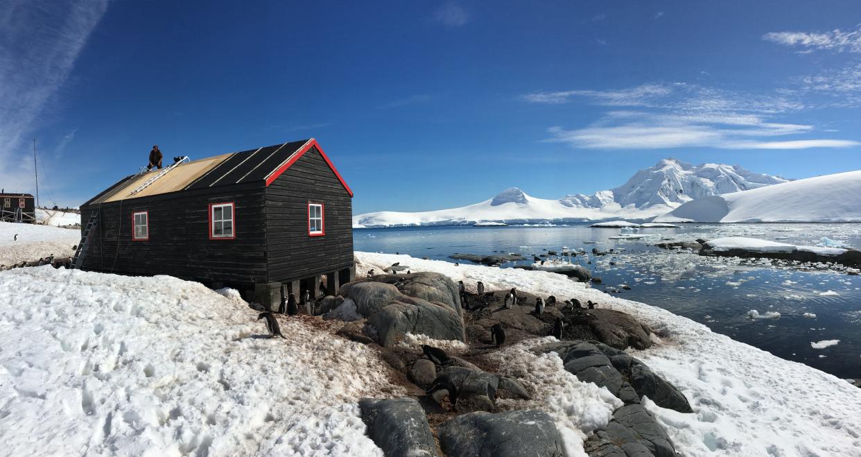 The post office at Port Lockroy, also known as the "Penguin Post Office," is on Goudier Island, just off the west side of the Antarctic peninsula.