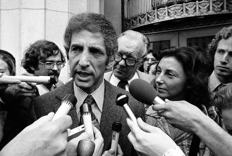 <p>Daniel Ellsberg, co-defendant in the Pentagon Papers case, talks to news reporters outside the Federal Building in Los Angeles on Friday, April 28, 1973, after the judge in the case released a government memorandum saying G. Gordon Liddy and E. Howard Hunt, convicted Watergate conspirators, had burglarized the office of Ellsberg’s psychiatrist. Ellsberg called it another instance of “political espionage.” (Photo: Wally Fong/AP) </p>