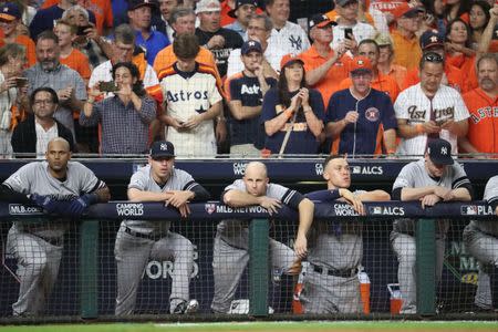 Oct 21, 2017; Houston, TX, USA; New York Yankees players look on from the dugout in the ninth inning during game seven of the 2017 ALCS playoff baseball series against the Houston Astros at Minute Maid Park. Thomas B. Shea-USA TODAY Sports