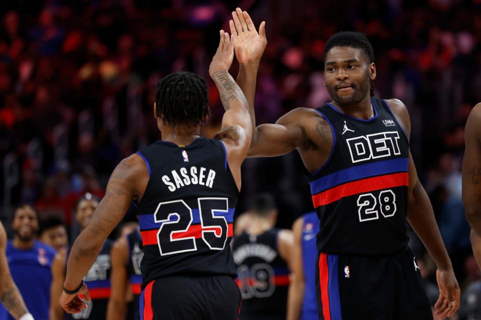 Detroit Pistons guard Marcus Sasser receives congratulations from center Isaiah Stewart in the second half against the Toronto Raptors at Little Caesars Arena on Wednesday, March 13, 2024.