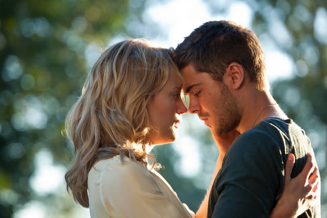 <p>Warner Bros Pictures/Kobal/Shutterstock</p> Taylor Schilling and Zac Efron in 'The Lucky One'.