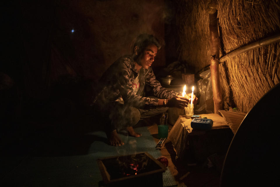 A Tigrayan refugee who fled the conflict in the Ethiopia's Tigray inside his shelter at Hamdeyat Transition Center near the Sudan-Ethiopia border, eastern Sudan, March 16, 2021. (AP Photo/Nariman El-Mofty)