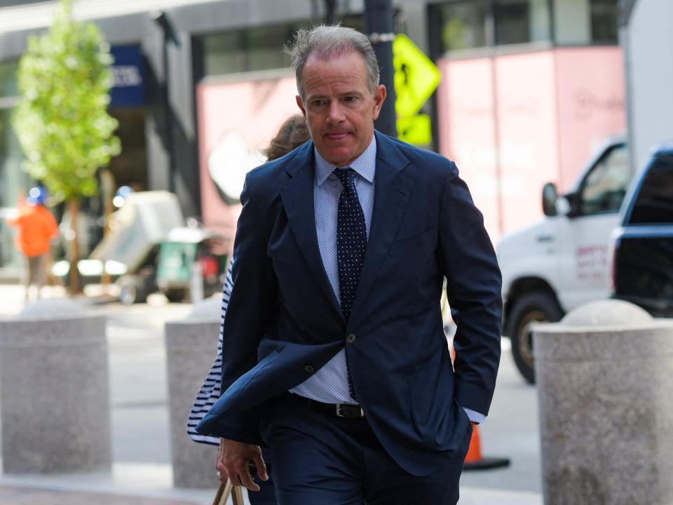 Georgetown University's former head tennis coach Gordon Ernst arrives at the federal courthouse for a sentencing hearing for his role in the vast U.S. college admissions fraud scheme called "Varsity Blues," in Boston, Massachusetts, U.S., July 1, 2022.