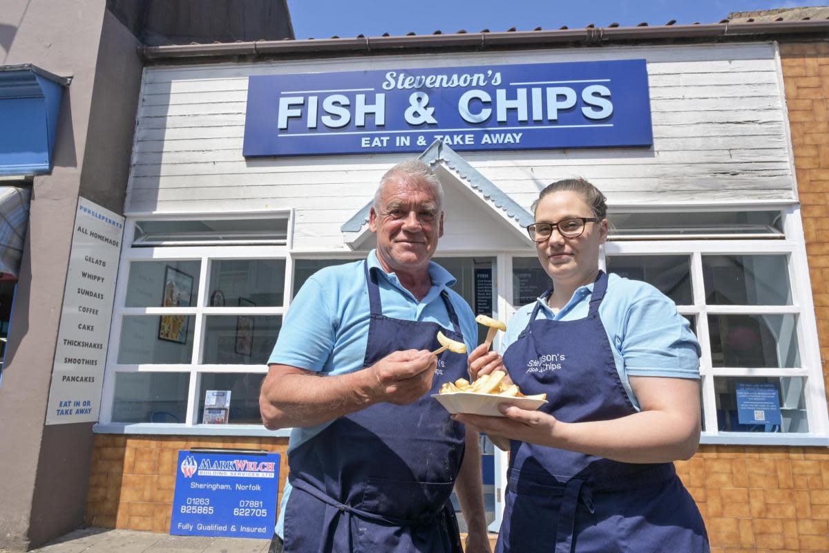 Stevenson’s fish and chip shop in Sheringham High Street has reopened, pictured owner Rob Wicks and supervisor Charlotte Sumner <i>(Image: Sonya Duncan)</i>