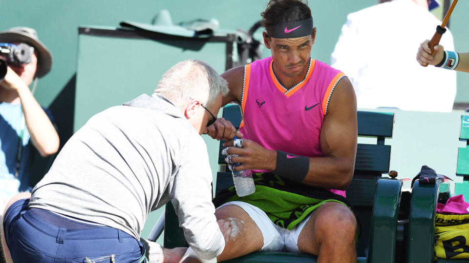 Rafael Nadal needed treatment for a knee issue during his quarter-final victory. Pic: Getty