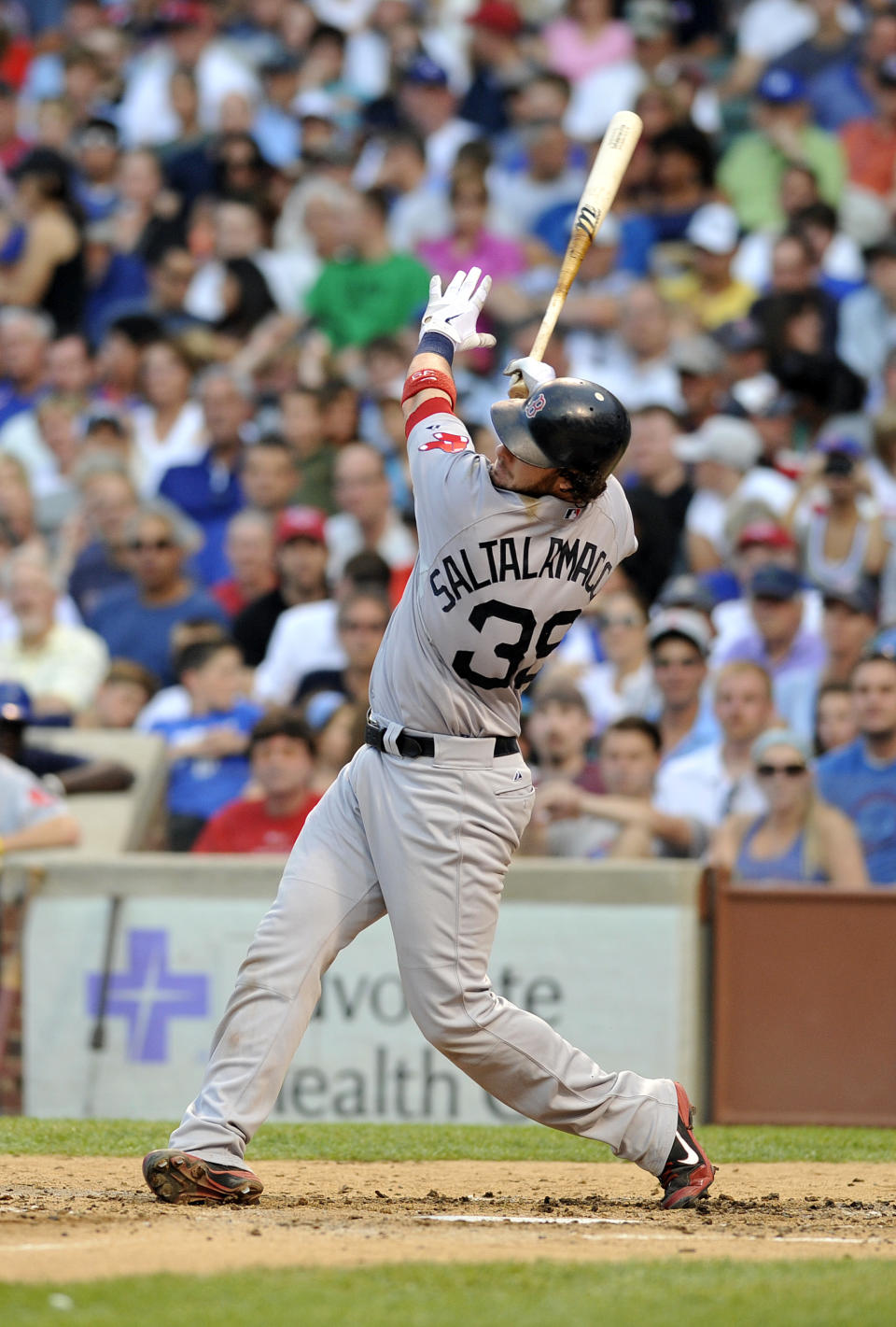 CHICAGO, IL - JUNE 16: Jarrod Saltalamacchia #39 of the Boston Red Sox hits a two-run homer against the Chicago Cubs in the fourth inning on June 16, 2012 at Wrigley Field in Chicago, Illinois. (Photo by David Banks/Getty Images)