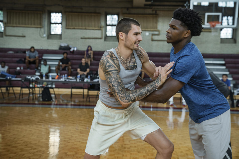 This image released by Netflix shows Juancho Hernangomez, left, and Anthony Edwards in a scene from "Hustle." (Scott Yamano/Netflix via AP)