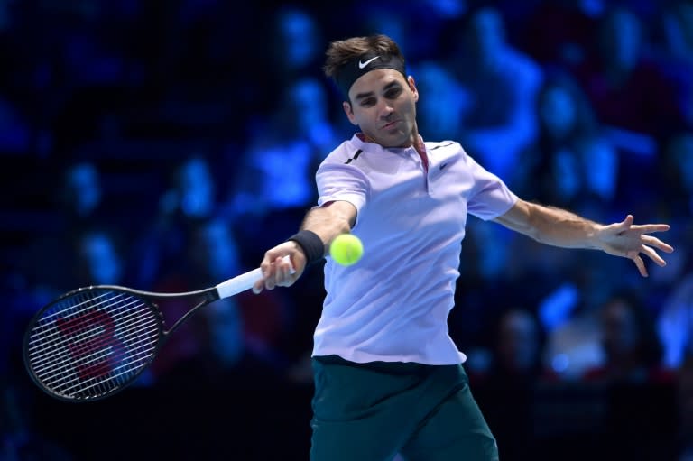 Switzerland's Roger Federer returns to Croatia's Marin Cilic