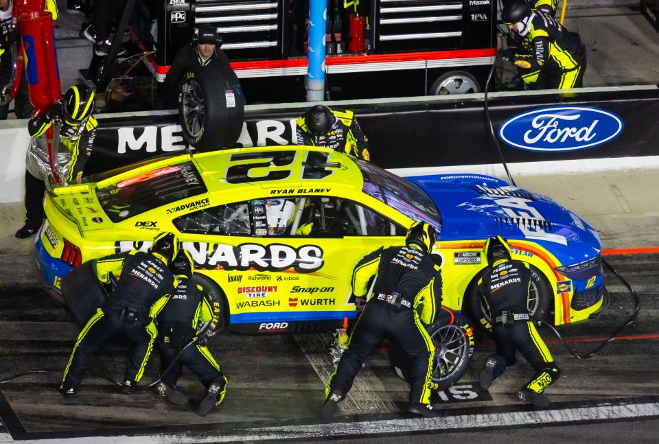 The pit crew works on Ryan Blaney's car during a pit stop at the Daytona 500 in February. The defending Cup Series champion is still trying to put last year's title in perspective. "It was a rush, kind of a blur," he said.