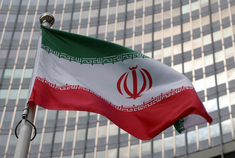 FILE PHOTO: The Iranian flag flutters in front of the International Atomic Energy Agency (IAEA) organisation's headquarters in Vienna