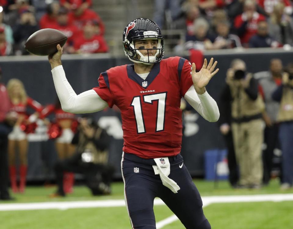 Houston Texans quarterback Brock Osweiler passes against the Jacksonville Jaguars during the first half of an NFL football game Sunday, Dec. 18, 2016, in Houston. (AP Photo/David J. Phillip)
