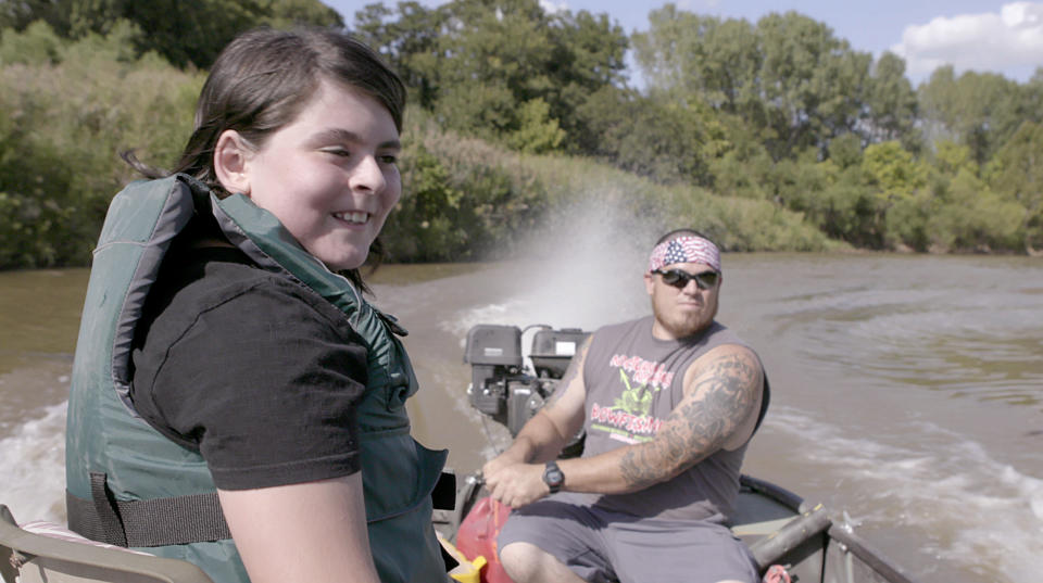 Matthew on a fishing trip with his father, Juan