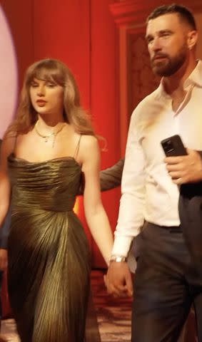 <p>Patrick Mahomes/15andmahomies/Instagram</p> Taylor Swift and Travis Kelce holding hands at Patrick Mahomes' charity gala on April 27 in Las Vegas
