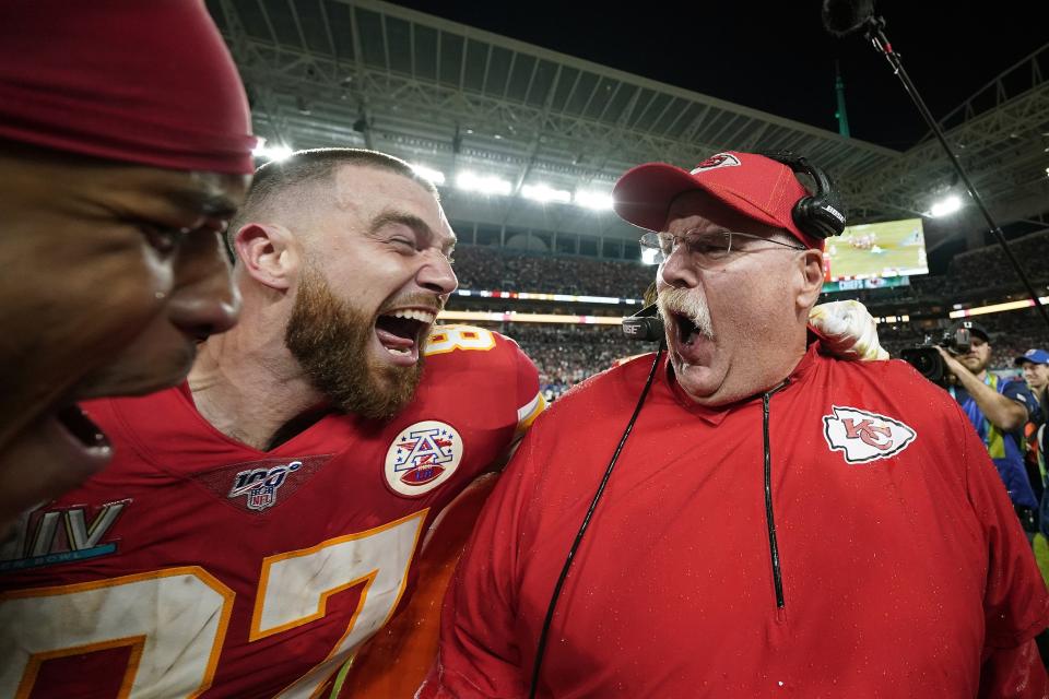 Kansas City Chiefs' Travis Kelce, left, celebrates with head coach Andy Reid after defeating the San Francisco 49ers in the NFL Super Bowl 54 football game Sunday, Feb. 2, 2020, in Miami Gardens, Fla. (AP Photo/David J. Phillip)