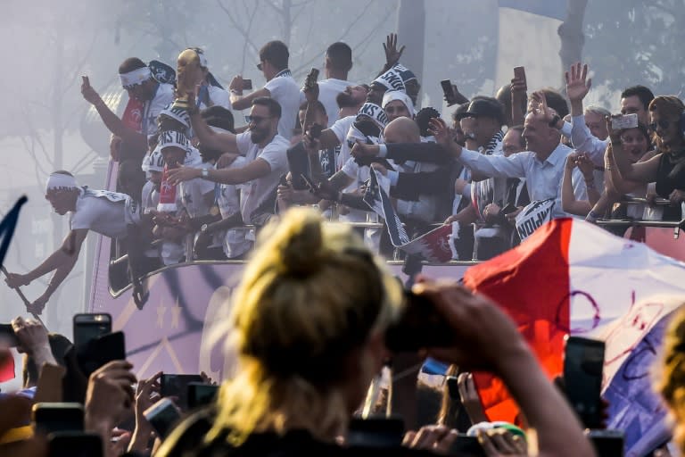 The French players were given a heroes' welcome as they displayed the golden World Cup trophy