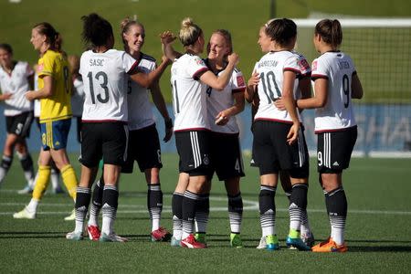 Jun 20, 2015; Ottawa, Ontario, CAN; Germany forward Celia Sasic (13) celebrates with teammates after defeating Sweden in the round of sixteen in the FIFA 2015 women's World Cup soccer tournament at Lansdowne Stadium. Germany won 4-1. Mandatory Credit: Matt Kryger-USA TODAY Sports