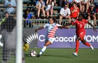 Oct 7, 2018; Cary, NC, USA; United States forward Mallory Pugh (11) makes a cross in front of Panama defender Maria Murillo (3) during the first half of a 2018 CONCACAF Women's Championship soccer match at Sahlen's Stadium. Rob Kinnan-USA TODAY Sports