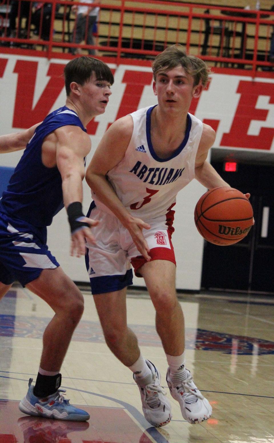 Martinsville junior Skyler Pruett drives to the basket during Saturday's home game against Columbus North. 