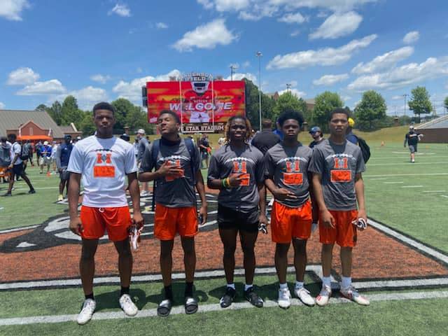 Nichols, second from left, participated in Withrow's camp stops last season and saw his recruiting take off in 2022 with 18 Division I offers.