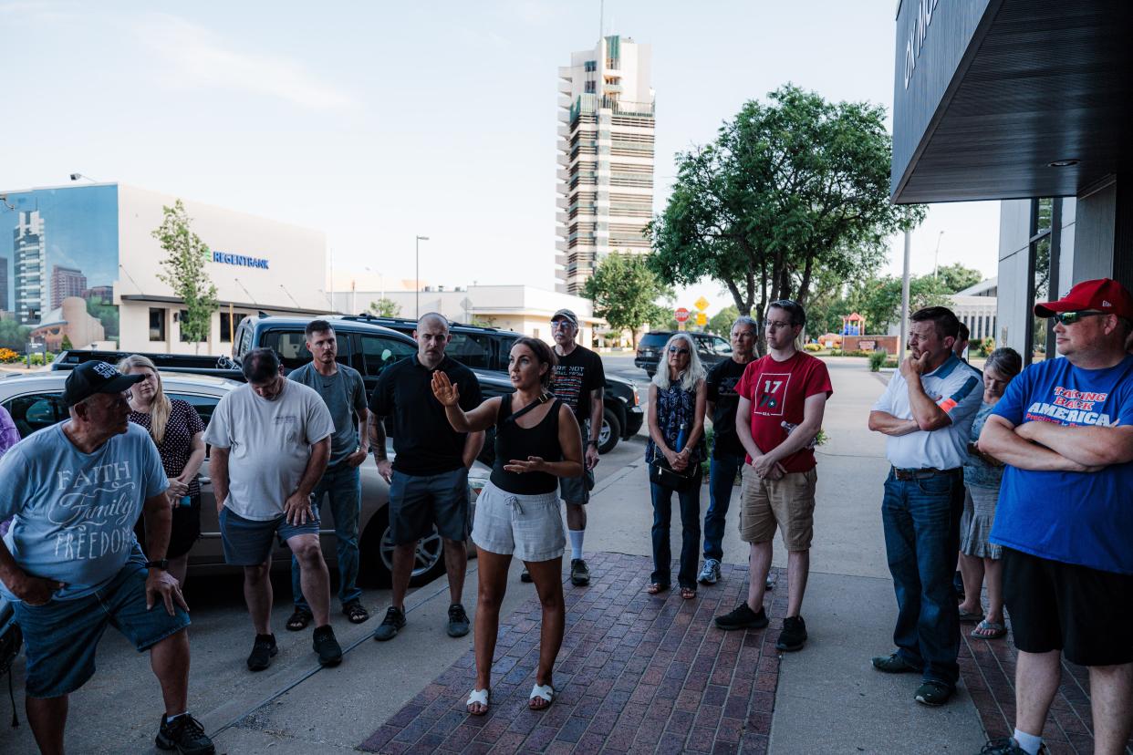 Precinct chairwoman Chelsie Wagoner took time to speak to the committee about her experiences with the GOP party during a meeting held on the sidewalk earlier this month.