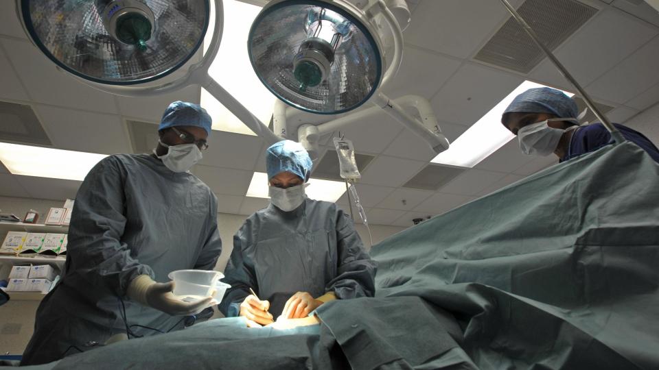 Image of surgeons performing an operation