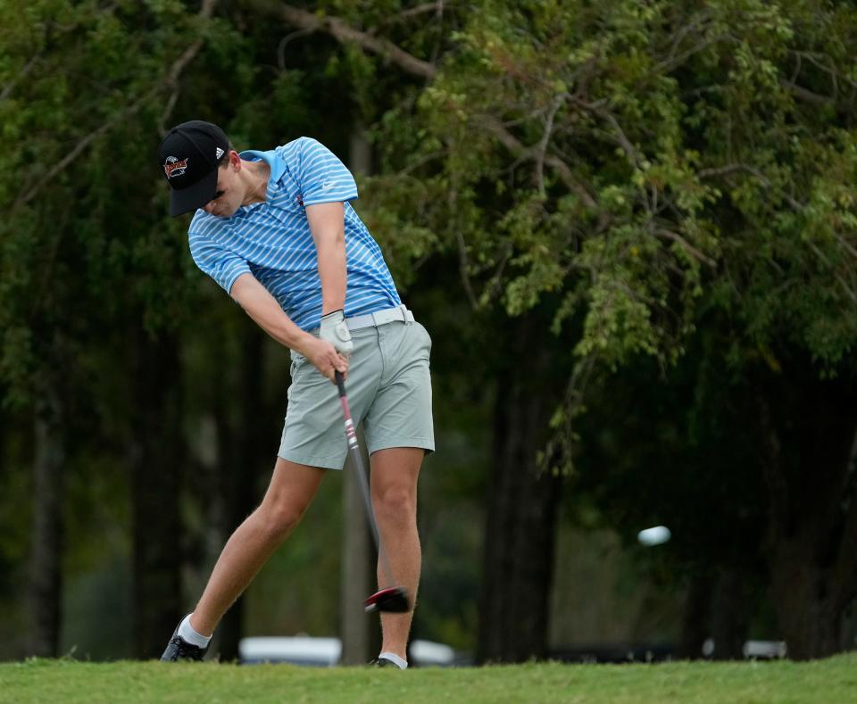 Spruce Creek's Jacob Watson tees off during practice, Thursday, Sept. 28, 2023.