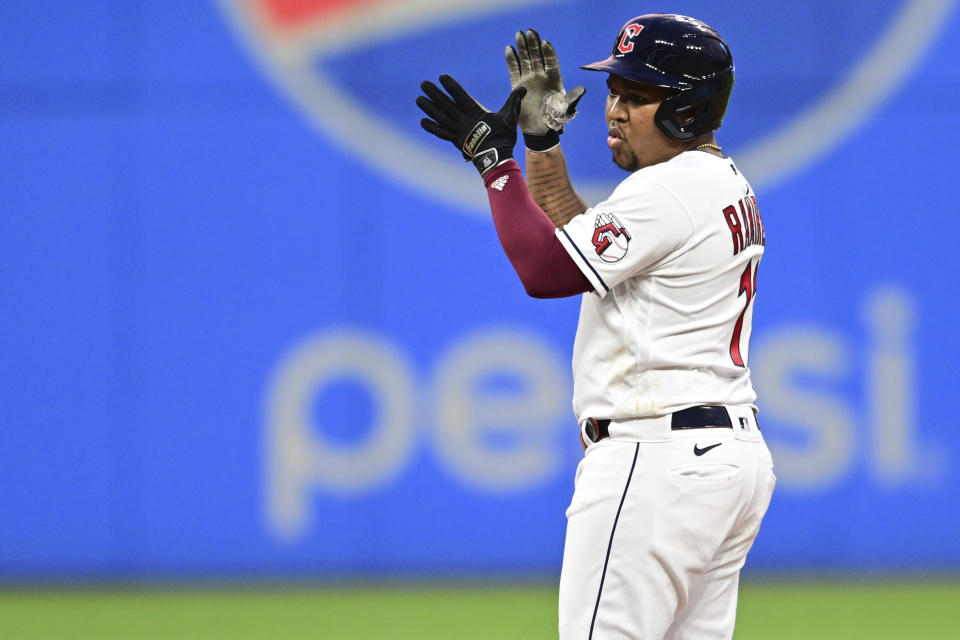 Cleveland Guardians' Jose Ramirez celebrates after hitting an RBI double against the Oakland Athletics during the seventh inning of a baseball game Tuesday, June 20, 2023, in Cleveland. (AP Photo/David Dermer)