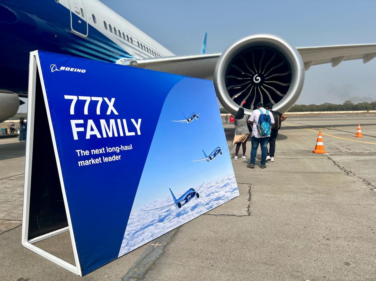 Boeing 777X sign saying "the next long-haul market leader"