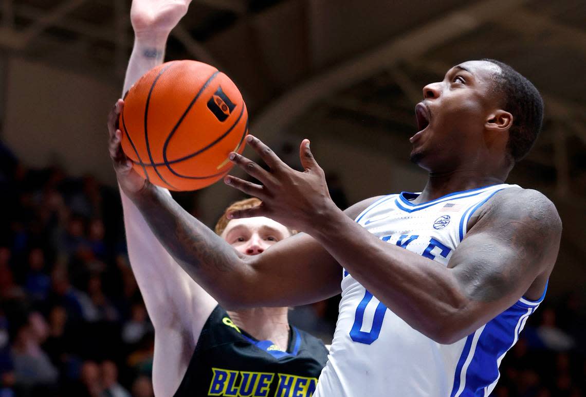 Duke’s Dariq Whitehead (0) drives to the basket past Delaware’s Christian Ray (5) during the second half of Duke’s 92-58 victory over Delaware at Cameron Indoor Stadium in Durham, N.C., Friday, Nov. 18, 2022.