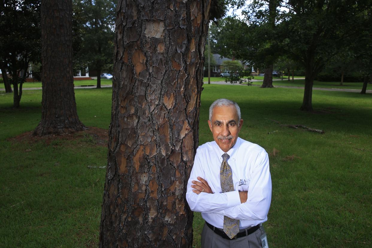 Jacksonville City Council President Ron Salem stands next to the pine tree that neighborhood children used as second base during baseball games at Four Corners Park when he was growing up in the Murry Hill neighborhood. Salem began his one-year term as council president on July 1.
