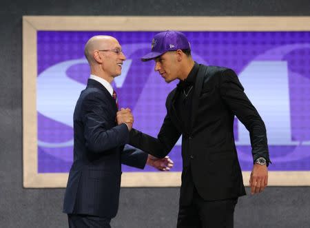 Jun 22, 2017; Brooklyn, NY, USA; Lonzo Ball (UCLA) is introduced by NBA commissioner Adam Silver as the number two overall pick to the Los Angeles Lakers in the first round of the 2017 NBA Draft at Barclays Center. Mandatory Credit: Brad Penner-USA TODAY Sports