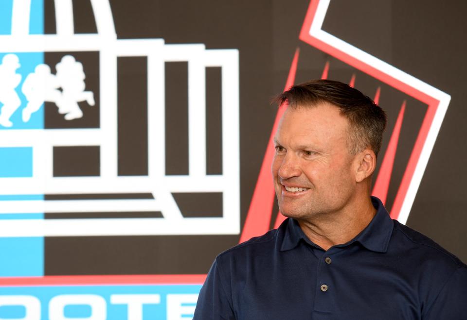 Zach Thomas answers question at the Pro Football Hall of Fame, Monday, March 6, 2023.